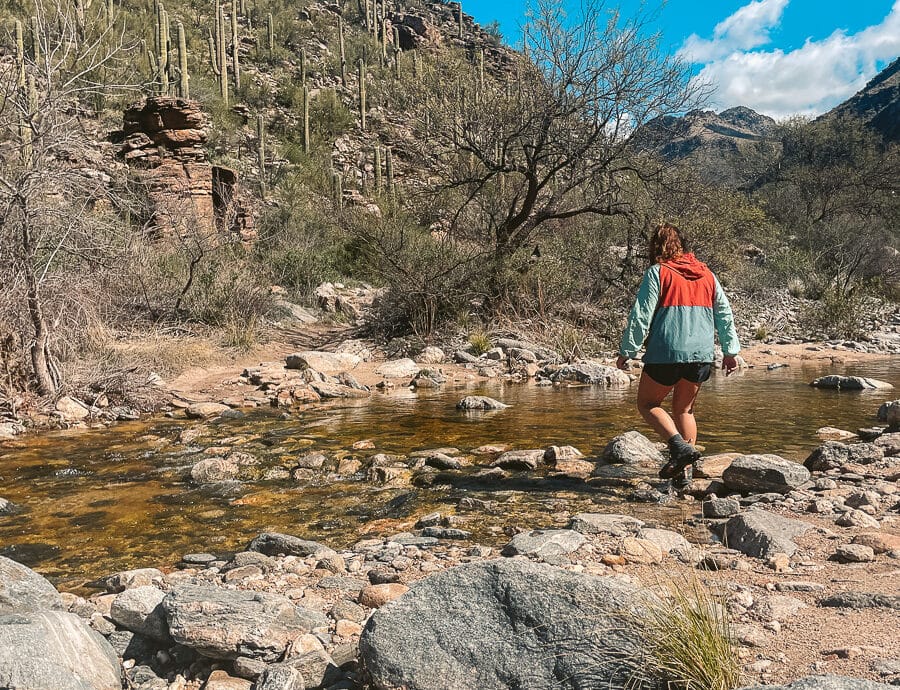One of the many river crossings along the way to Seven Falls. The water isn't deep but can be passed by stepping stones.