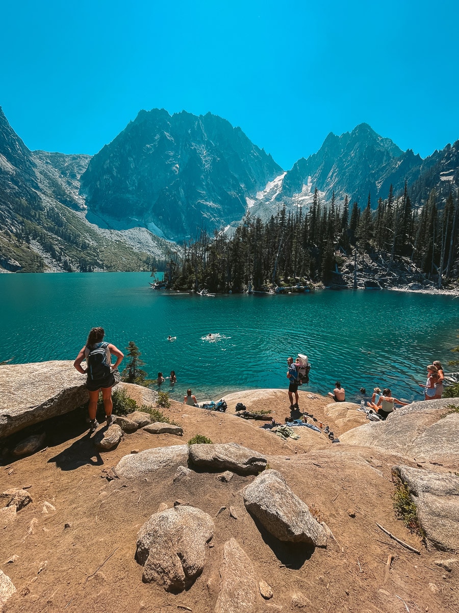 Finding a rock to sit at and eat lunch while taking in the views of Colchuck Lake. 
