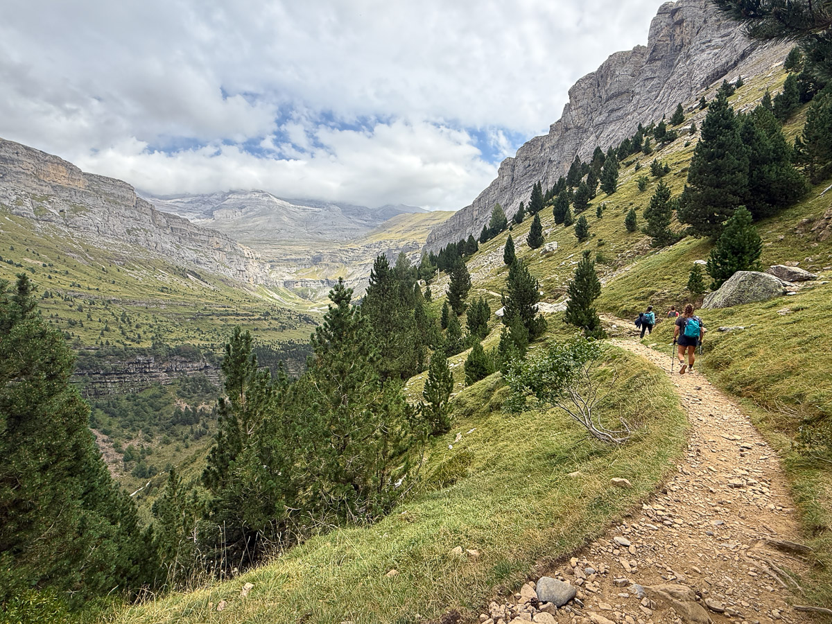 Hiking along the famous Faja de Pelay ledge in Ordesa Valley.