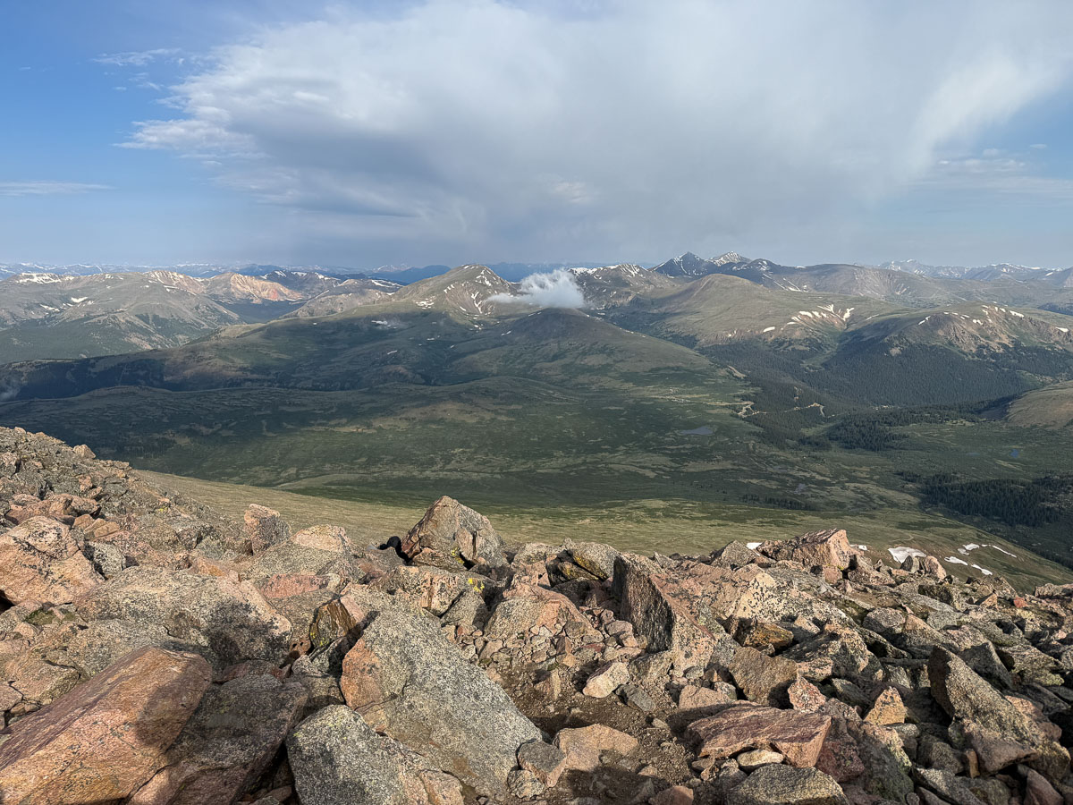 The summit of Mount Bierstadt in Colorado with other peaks in the background.